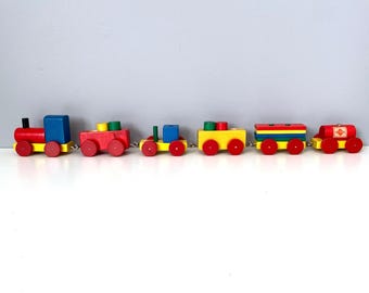 Tiny colorful wood train made in Western Germany