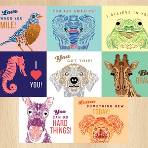 May include: Nine colorful cards with animal illustrations and positive messages. The cards feature a bluebird, elephant, frog, seahorse, dog, giraffe, donkey, koala, and the text "I Love When You Smile!", "You Are Amazing!", "I Believe In You!", "I Love You!", "You Got This!", "Be Brave!", "You Can Do Hard Things!", and "Learn Something New Today!"