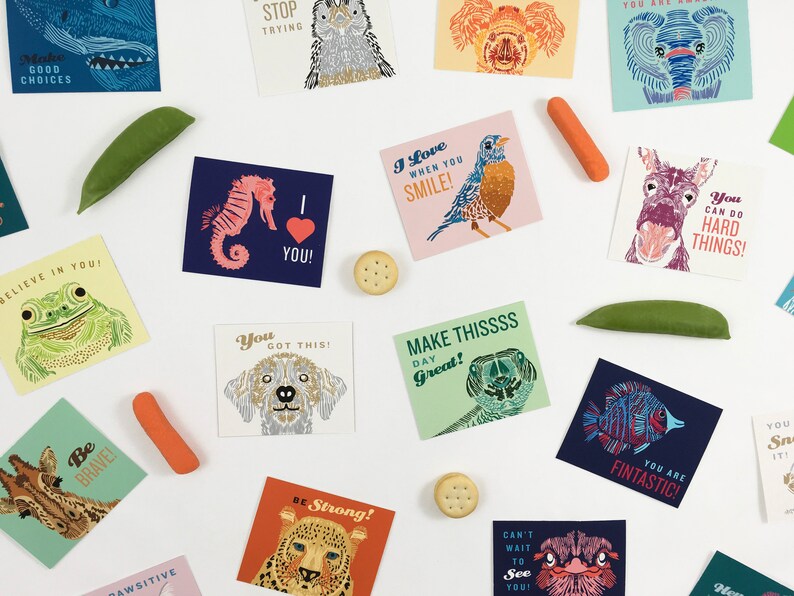 May include: A set of colorful cards with illustrations of animals and inspirational messages. The cards feature phrases like "Make Thissss Day Great!" and "You Got This!"