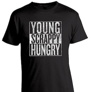 May include: Black t-shirt with a white distressed graphic that says "YOUNG SCRAPPY HUNGRY".