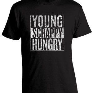 May include: Black t-shirt with a white distressed graphic that says "YOUNG SCRAPPY HUNGRY"