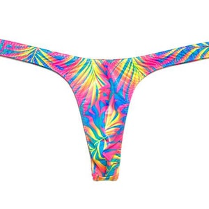 Traje de baño tipo tanga súper ajustado ED* de la marca Tropics, color turquesa y rosa para hombre.
