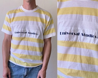 80s Universal Studios graphic t-shirt, yellow striped crew neck short sleeve tee shirt, mens size large