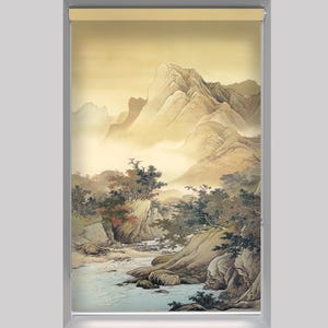 May include: A beige window blind with a watercolour painting of a mountain landscape. The scene features a river flowing through a valley with trees and rocks. The mountains are in the background and the sky is a light yellow.
