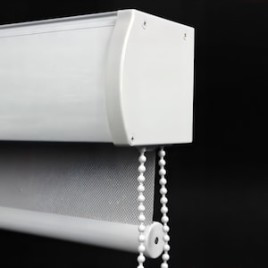 Decorative valance roller shade cassette available in 4 basic colors (white, beige, silver, black) & option to be hand painted in 24 colors
