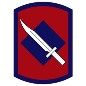 May include: A red and blue military unit patch with a white dagger inside a blue diamond.