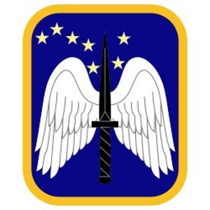 May include: A blue patch with a white winged dagger and five yellow stars in the upper left corner. The patch has a gold border.