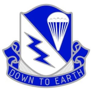 May include: A blue and white military unit patch with a white parachute and lightning bolt design. The patch has a white ribbon with the words "Down to Earth" in silver lettering.