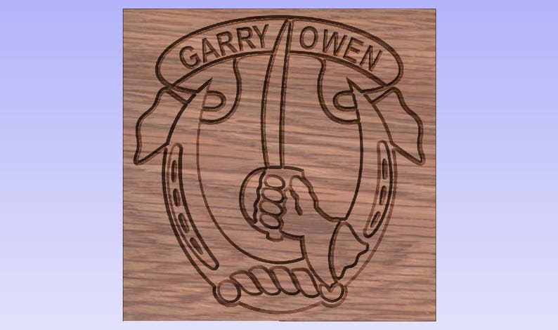 May include: A wooden plaque with a carved design of a horseshoe, a sword, and a hand holding the sword. The text "GARRY OWEN" is carved above the design.