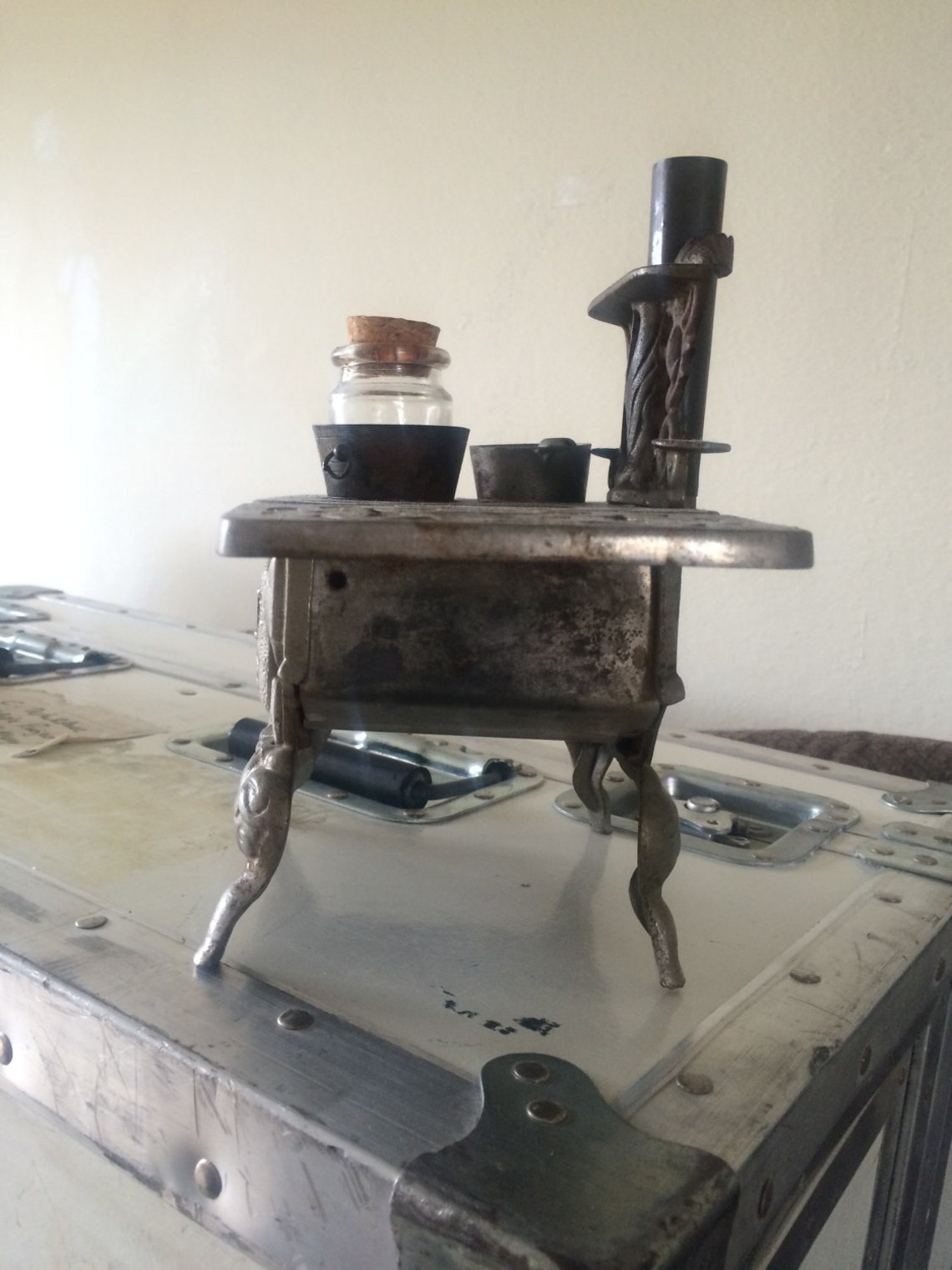 Vintage cast iron miniature stove with pots. Etsy