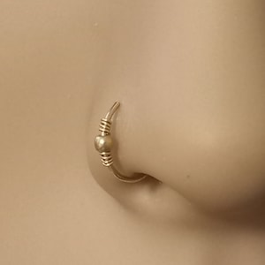 Nepneusringhoepel, nepneuspiercing, nepneushoepel, neussieraden, nepneusring, nepneushoepel, neusmanchet, niet-doorboorde neusring