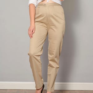 Size 8 10 | High Waisted Beige Pegged Pants | Fitted Tapered Tan Retro Slacks | Zipper Fly 90s Vintage Pocketless Formal Trousers