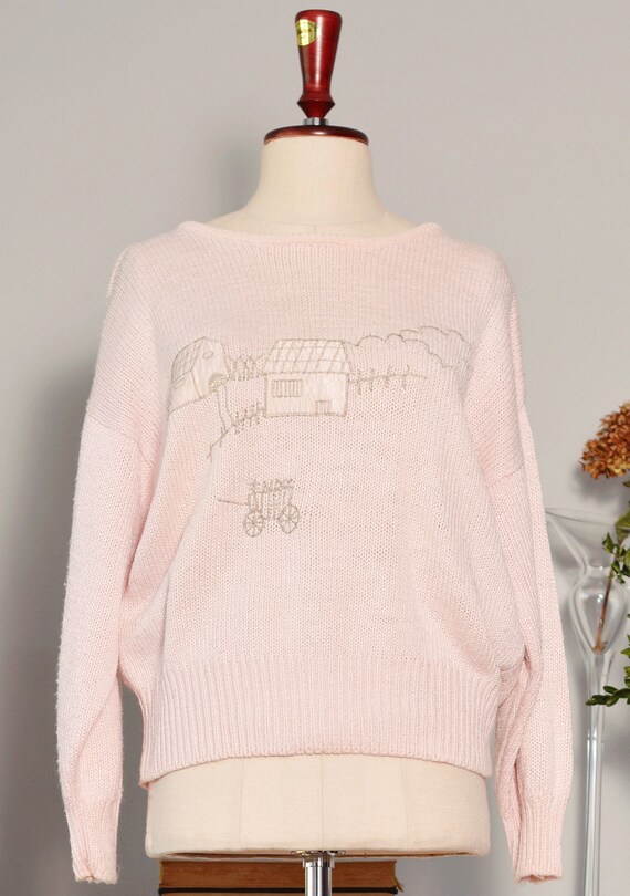 pastel pink sweater