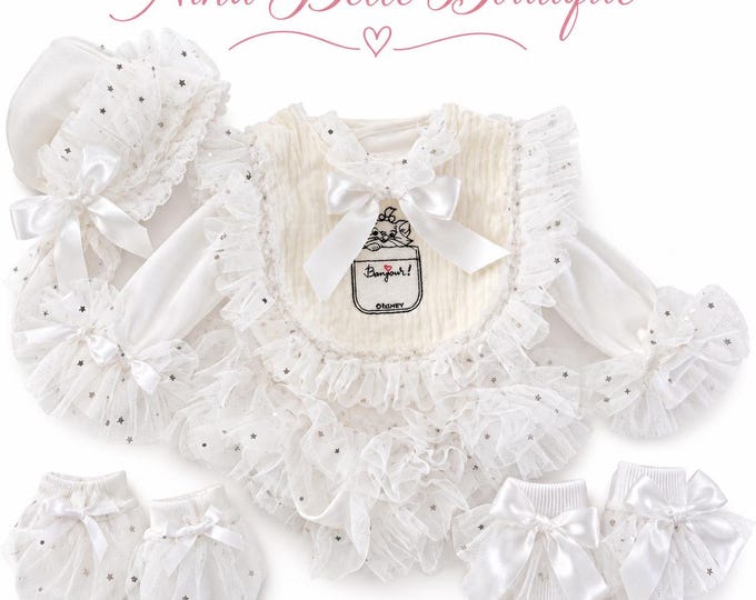 Tiny baby five piece set includes vest ,bonnet, socks ,mittens and bib