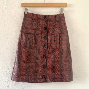 Urban Outfitters vinyl snake mini skirt image 2
