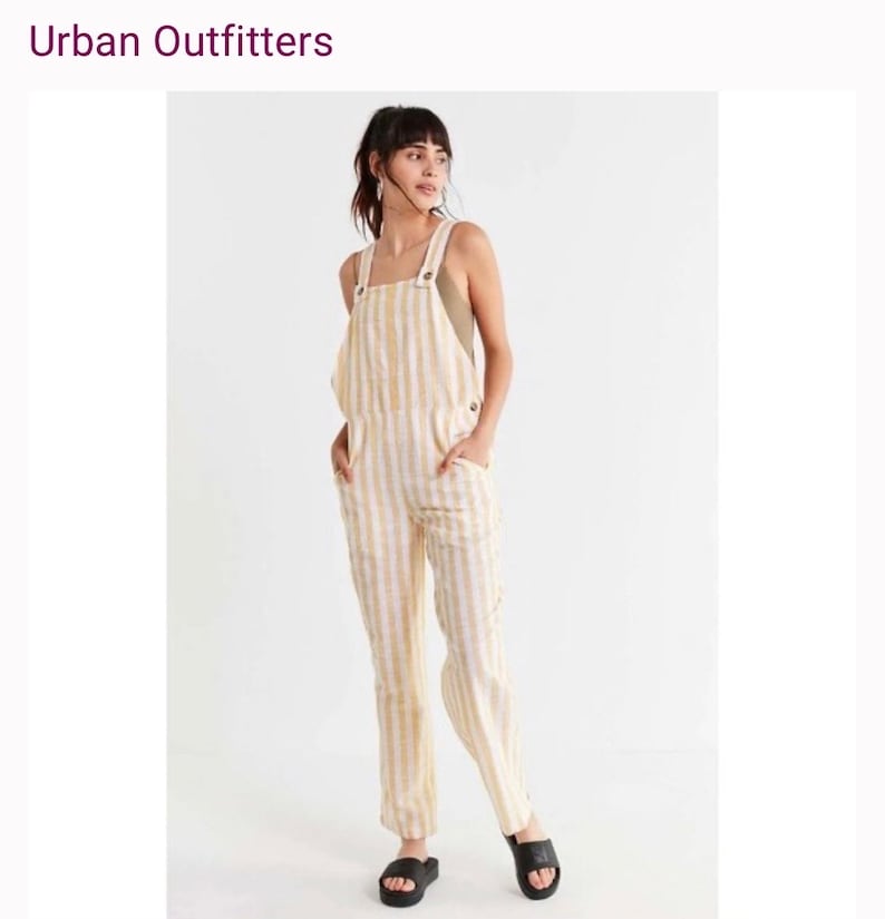 May include: White and yellow striped linen overalls with a square neckline and adjustable straps. The overalls have two front pockets and a relaxed fit.