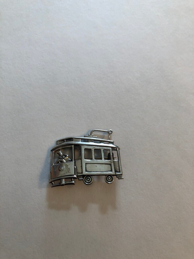 Vintage sterling silver trolley car brooch signed LS
