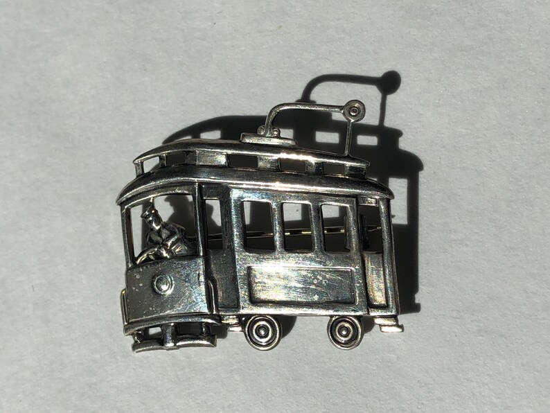 Vintage sterling silver trolley car brooch signed LS