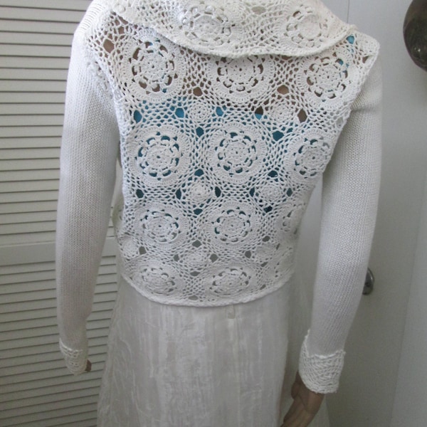 Vintage cotton crochet and rayon knit white evening sweater pearl and rhinestone clasp. Alaris label made in USA Full crochet back and neck.