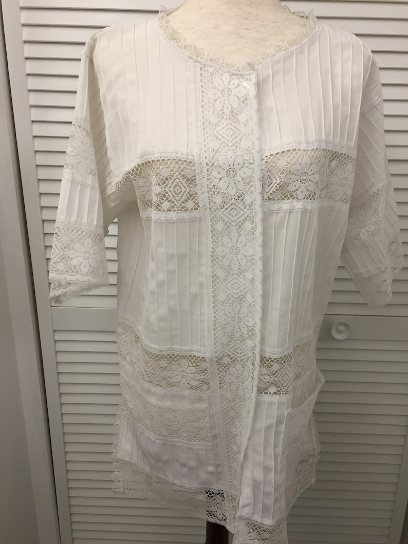 White cotton blend tunic bathing suit cover blouse lace trim Like new see through lace top for many different uses Boho to dressy summer top