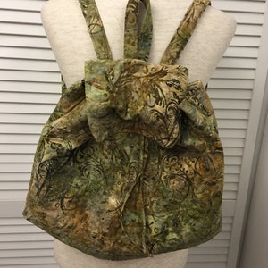 Green abstract batik style print all cotton backpack w drawstring top and small top handle. Unisex backpack Summer weight backpack
