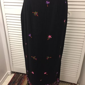 Black maxi skirt with embroidered flowers &fringed hem Thin 100% wool w/ lining Go with everythingboho sophisticated maxi skirt Renee Derby