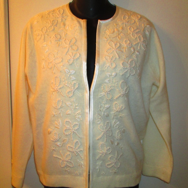 Vintage lined cream wool satin souchet evening sweater. Adkins made in British Hong Kong circa 1950's or 60's. Perfect vintage condition.