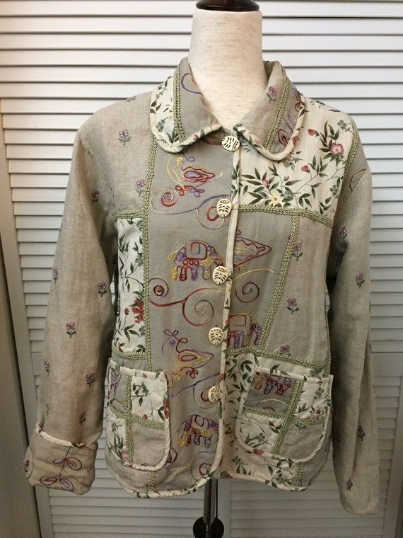 Beige linen and cotton jacket embroidered and flor