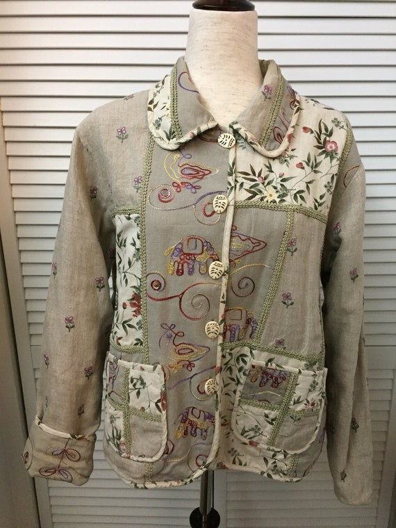 Beige linen and cotton jacket embroidered and floral patterns. Leap in to spring  w/ this versatile organic vtg jacket. Size PL