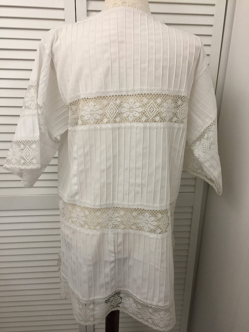 White cotton blend tunic bathing suit cover blouse lace trim Like new see through lace top for many different uses Boho to dressy summer top
