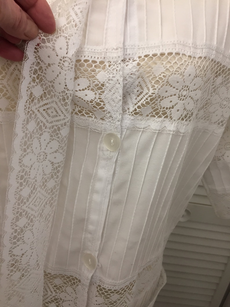 White cotton blend tunic bathing suit cover blouse lace trim Like new see through lace top for many different uses Boho to dressy summer top