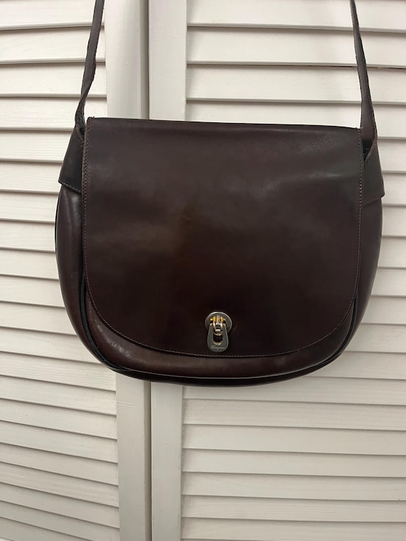 Salvadore Ferragamo purse Dark brown smooth leather half moon horseshoe shape adjustable strap leather lining Classic understated vtg