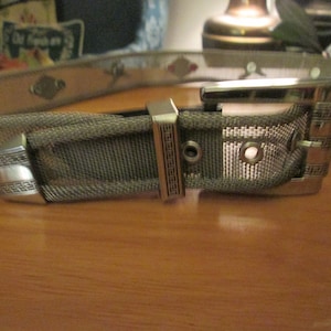 Vintage  silver  mesh belt  with  flying  eagle and painted  diamond  shape  adornment all around the belt Size XL fits 38  to 42 inch waist