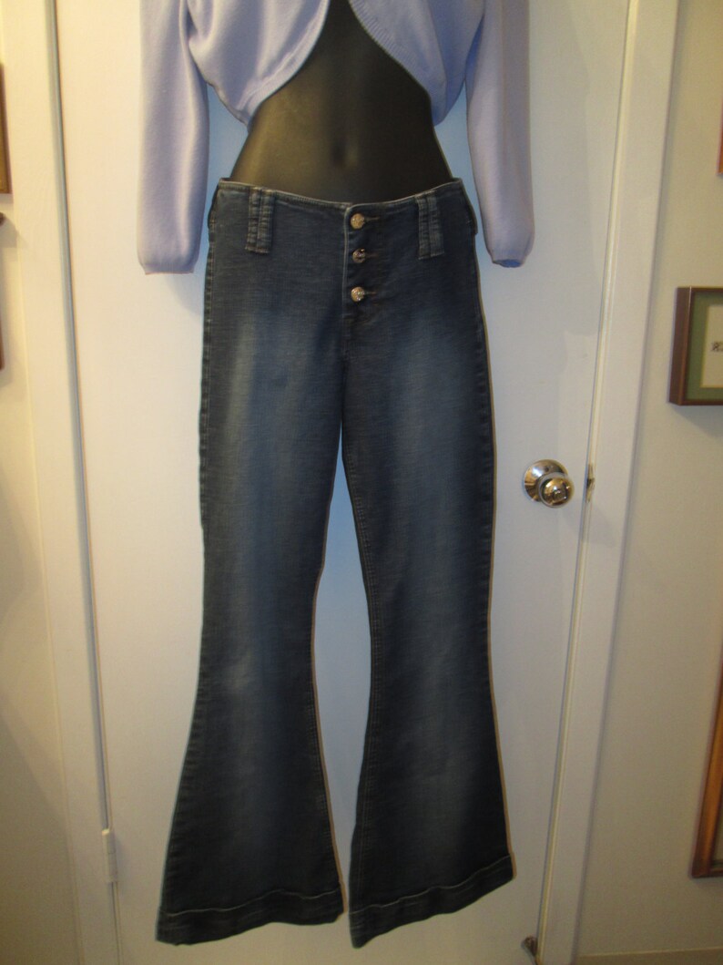 distressed jeans at the bottom