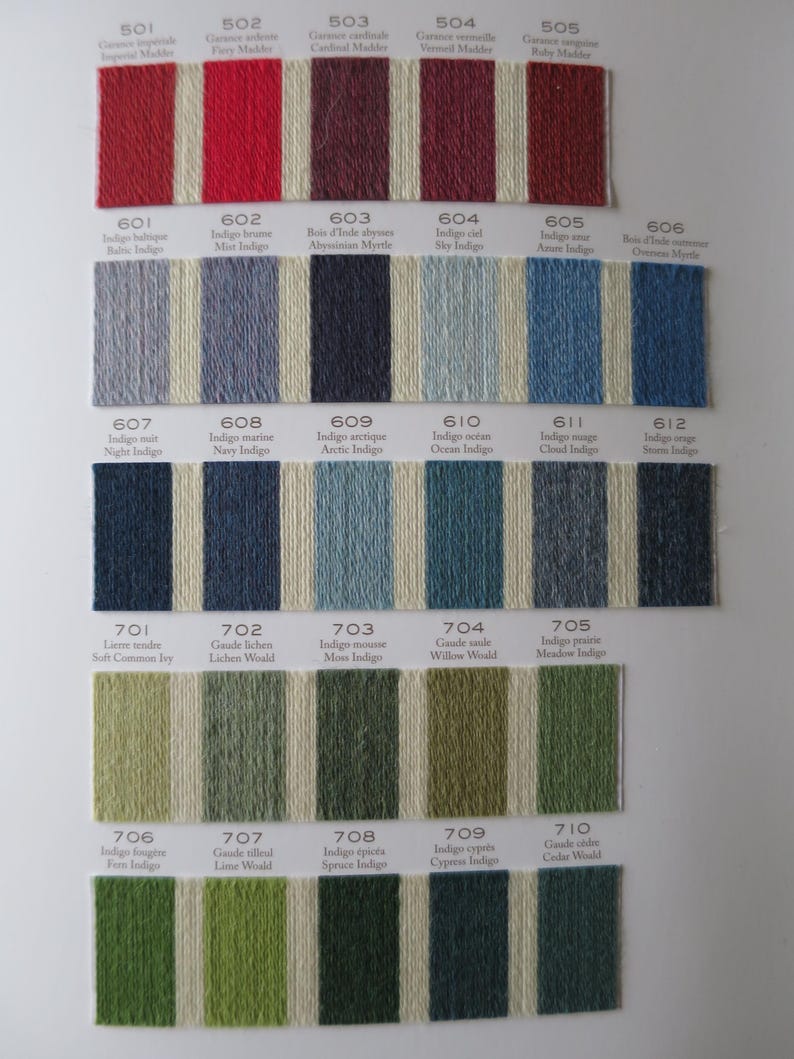 May include: A color chart of yarn samples, with each color swatch labeled with a number and a descriptive name. The colors range from red, orange, yellow, green, blue, purple, and brown.