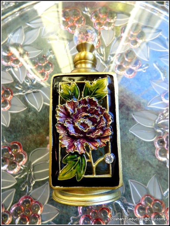 Exquisite and stunning, beautifully enamelled, luxury compact hand-finished with care, encrusted with semi-precious stones perfume bottle