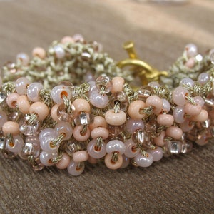 Cream Peaches Beaded Knit Cuff Bracelet