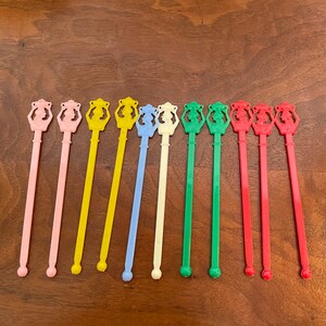 Set Lot Vintage Lady with Jug Baskets on head Plastic Swizzle Sticks Stirrers