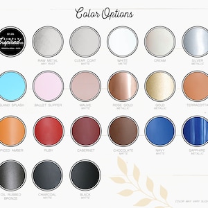 May include: Color options chart for a product, showing 16 different color choices. The colors are arranged in four rows of four circles each. The colors include raw metal, clear coat matte, white matte, cream, silver metallic, island splash, ballet slipper, mauve matte, rose gold metallic, gold metallic, terracotta, spiced amber, ruby, cabernet, chocolate matte, navy matte, sapphire metallic, oil rubbed bronze, charcoal matte, and black matte. The text "Color May Vary Slightly" is at the bottom of the chart.