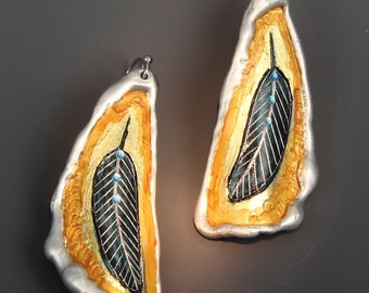 Feather Earrings, Handmade by Metalsmith Monte Voepel.