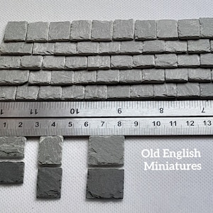 Real miniature rustic tiny slate roofing tiles for dollshouse or any miniature building projects,  green in colour,  hand crafted by Old English Miniatures using age-old traditional methods,  hand split and feather edged,  to give that authentic  look,  great for many other miniature projects like, fairy houses,  bird houses,  Art, Mosaics, architectural models,  model castle, the ruler shows the approx size