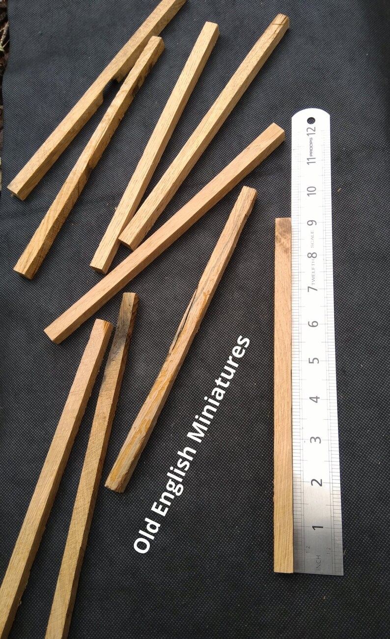 Real miniature vintage rustic oak beams, for dolls farmhouse, dolls Tudor house, dolls haunted house, miniature, Architectural model, model railway, model castle, arts and crafts, handcrafted by Old English Miniatures from reclaimed vintage oak, Size approx 9"inch/225mm long x 10mm x 10mm, each pack contains 9 pieces, available from my Etsy store, the ruler gives an idea of sizes