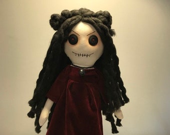 creepy cloth doll