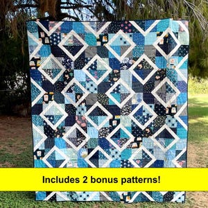 May include: A rectangular quilt featuring a patchwork design of various blue, navy, and white fabric squares arranged in a diamond pattern. The quilt includes a yellow banner at the bottom with the black text: Includes 2 bonus patterns!
