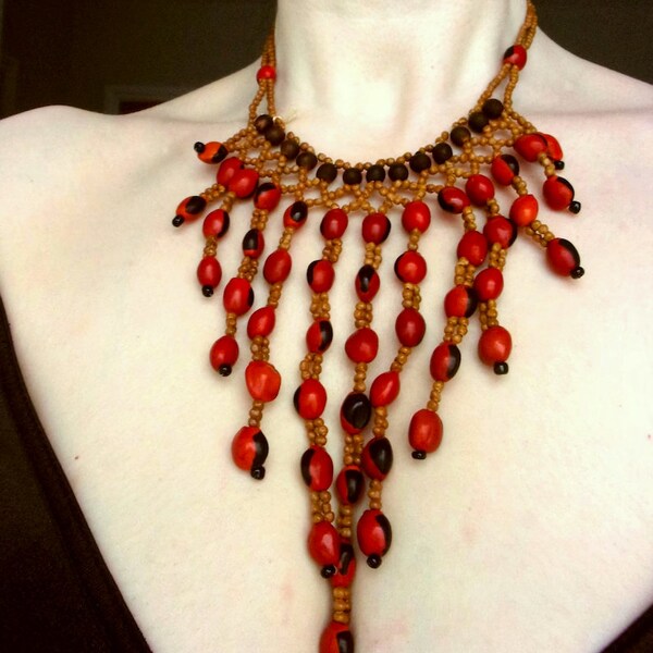 Handcrafted African Fringe Necklace Red Beaded Bib Necklace w Nuts Seeds Ethical Sustainable Fashion Bohemian Tassel Accent Red-Beige D:36cm