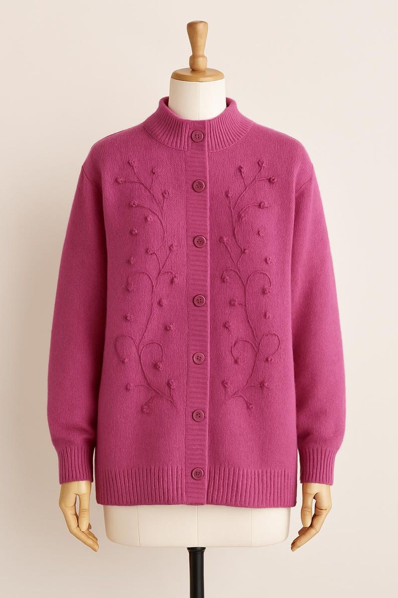 Lilac mohair oversized cardigan with textured knit and buttons worn with a black skirt.