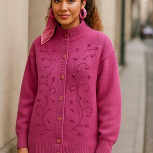 Lilac mohair oversized cardigan with textured knit and buttons worn with a black skirt.