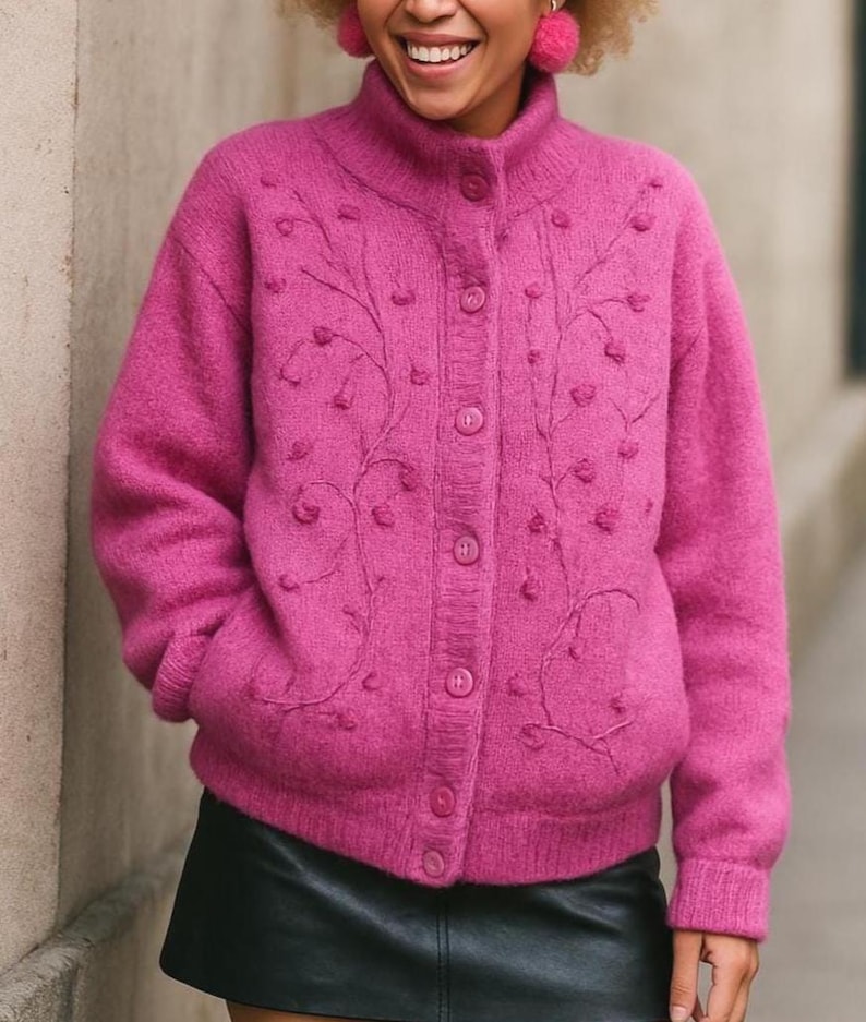 Lilac mohair oversized cardigan with textured knit and buttons worn with a black skirt.