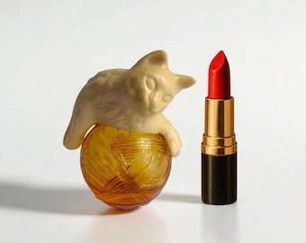 Vintage Avon Perfume Bottle: Amber Glass Cat Decor, Mid-Century Collectible