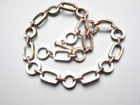 Brutalist Necklace: 2000s Industrial Style, Sculptural Steel, Geometric Link Chain, Toggle Closure, Silver-Toned Choker
